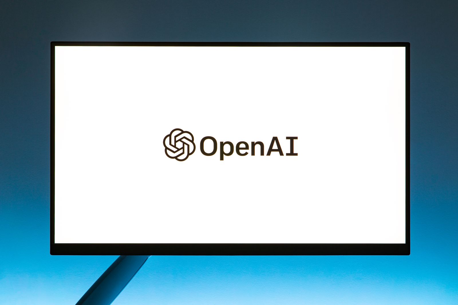 Logo OpenAI affiché sur un écran d'ordinateur.
